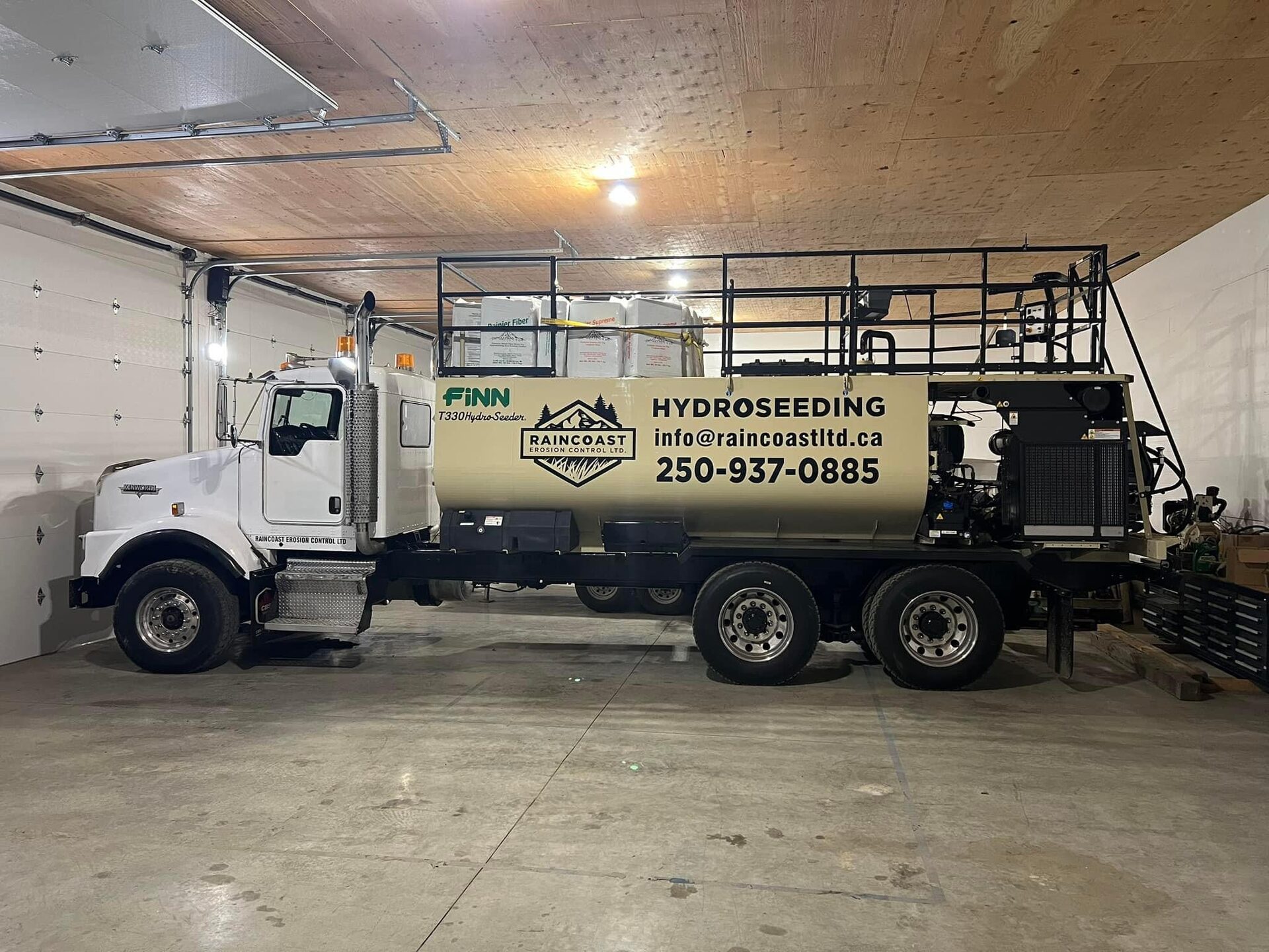 Finn T330 hydroseeder truck in the shop, ready for the season